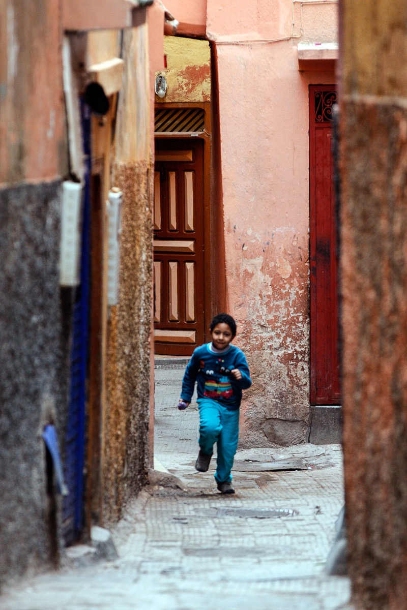 Running boy, Marrakesh, Morocco