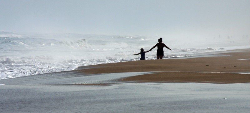 Mother and daughter, Montauk, NY beach
